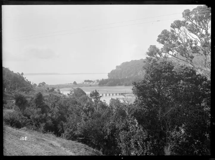 Black and white image of the estuary at Waiwera Beach circa 1890.