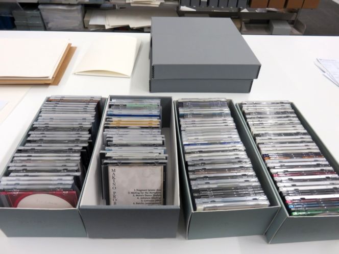 Optical discs separated into those containing audio files, video files, or computer files.