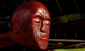Carved figurehead on a war canoe at Waitangi, NZ