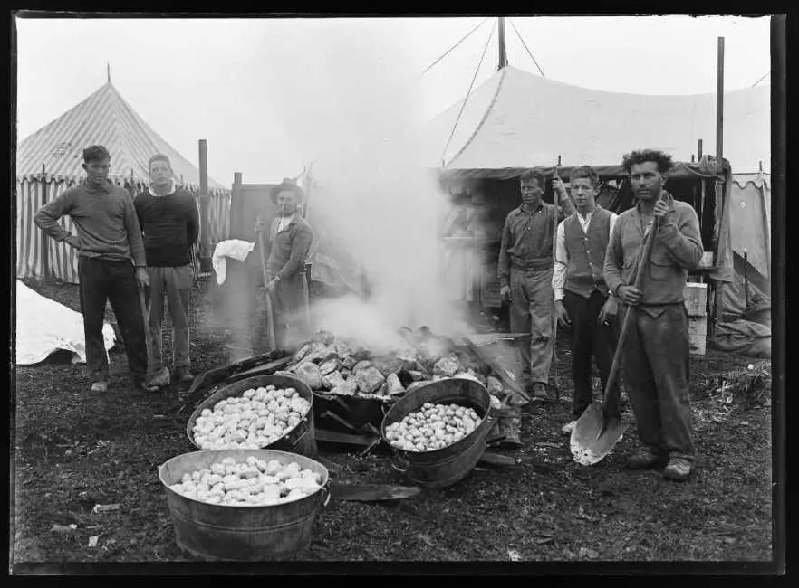 Peeling potatoes for a hāngi, 1931