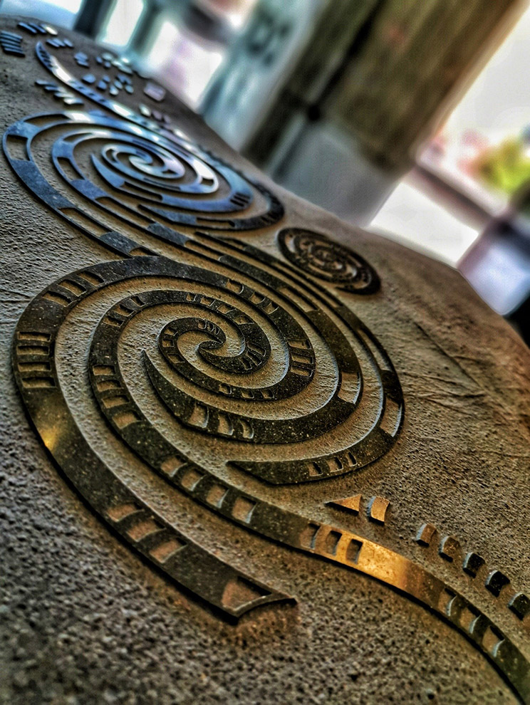 Spiral rock carving.
