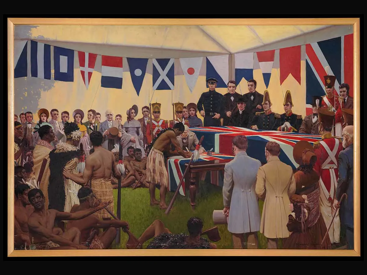 A painting of a modern reconstruction showing Tāmati Wāka Nene (Ngāpuhi) signing Te Tiriti | the Treaty in front of James Busby, William Hobson and other British officials and witnesses. Some Māori representatives are gathered on the left. 