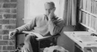 Frank Sargeson sitting inside his house at 14 Esmond Road, Takapuna, Auckland, in 1947.