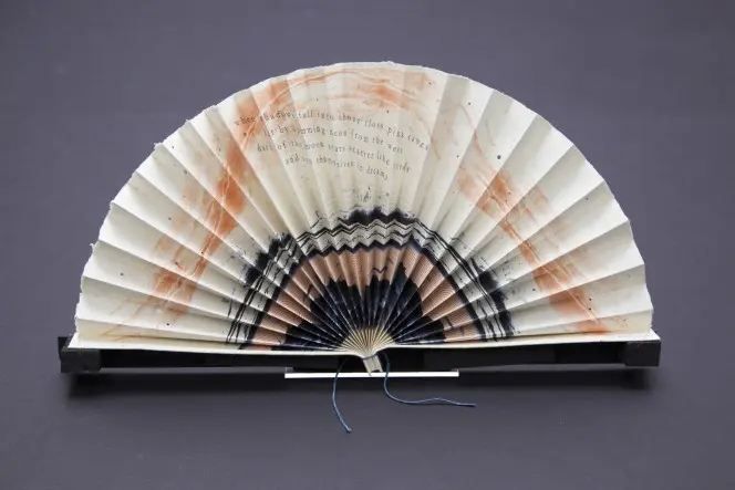 A printed Japanese-style hand fan.