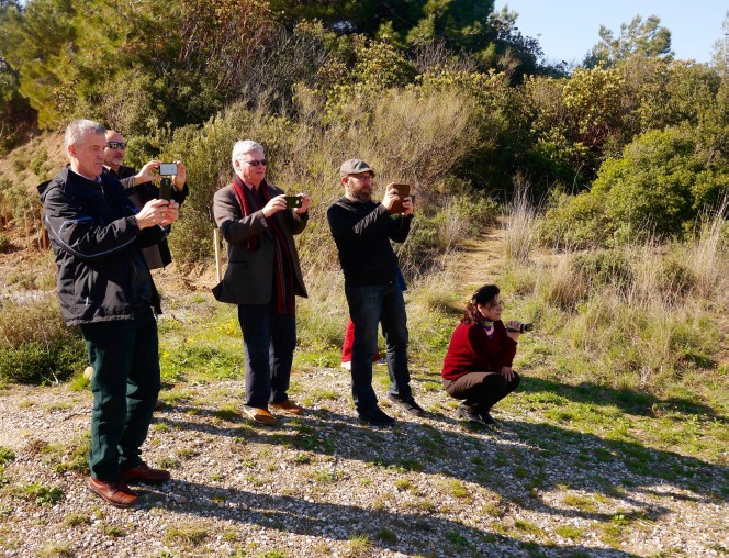 Conference delegates taking photographs at ANZAC Cove.