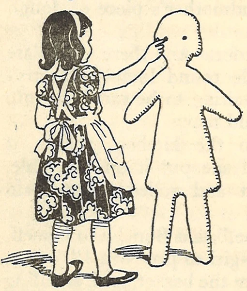 An illustration of a girl wearing a dress and apron making eyes on a dough girl the same size as her.