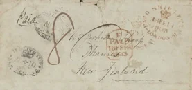 The outside of a yellowed letter showing postal markings, stamps, and name and address.