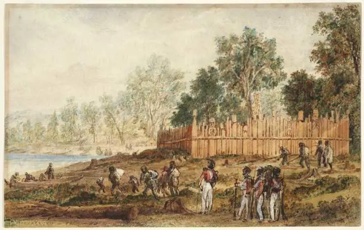 Shows the Makaenuku Pa in the Hutt Valley. Five British soldiers stand in the right foreground, watching Maori with bundles leaving the pa and walking towards a canoe near the water at the left. The palisades around the pa have carved upright posts.