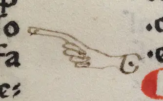 Manicule (pointing hand) on f.5 in Clemens, Constitutiones.