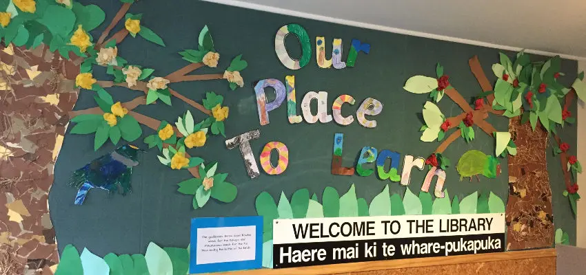 Sign with 'Our place to learn' and 'Welcome to the library'.