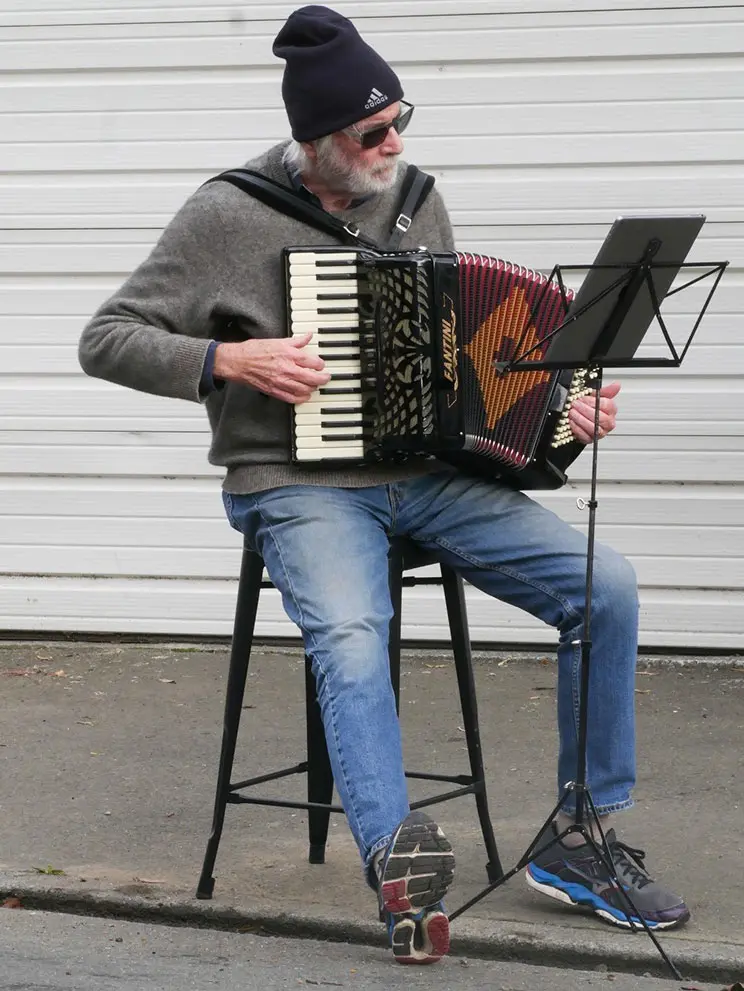 Man playing an accordion.