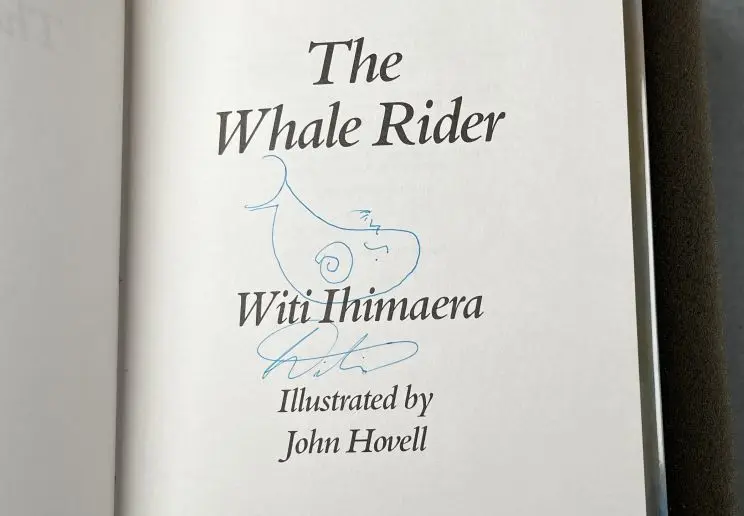 Author's signature on the title page of this annotated copy. 
