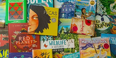 Selection of books from National Library's School Lending Collection, including books in world languages,  read alouds, books in accessible formats, books for teaching Aotearoa NZ's histories curriculum, fiction and non-fiction for all year levels.