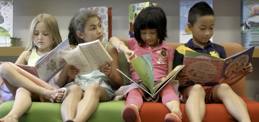 Children reading in their school library