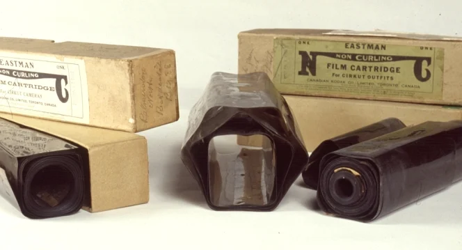 Tightly wound negatives creased from the interior of the original boxes in which they were stored.