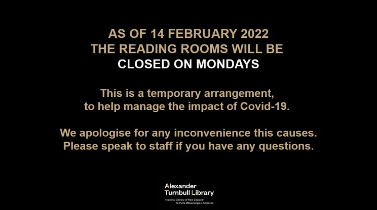 A slide with black background and khaki-coloured text used for displaying on large screen outside reading room reads: "As of 14 February 2022 the reading rooms will be closed on Mondays. This is a temporary arrangement to help manage the impact of Covid-19. We apologise for any inconvenience this causes. Please speak to staff if you have any questions."