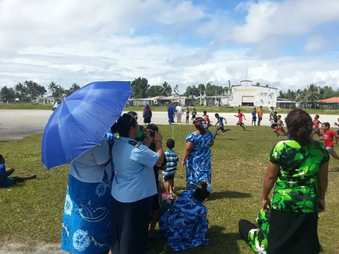 Women watching the finish line for the sprint events.