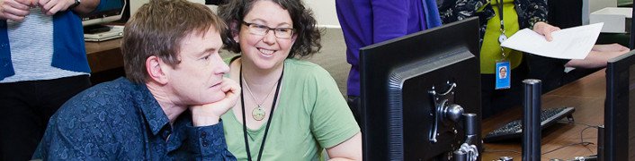 Librarians at a computer