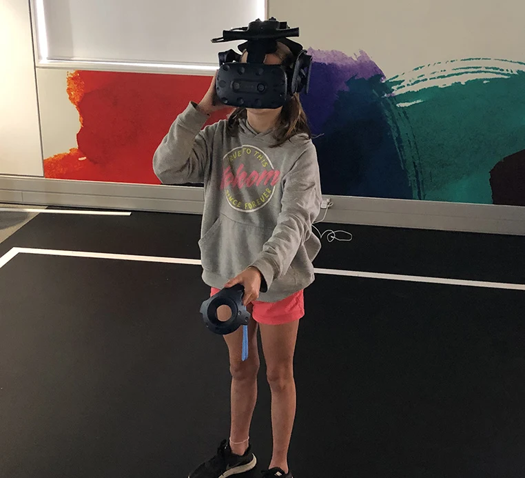 Student using the virtual reality device at He Tohu Tāmaki
