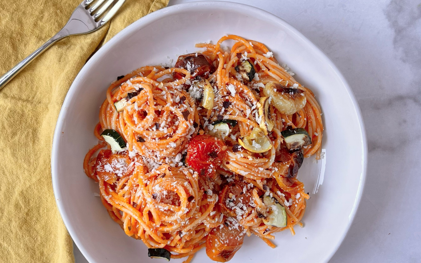 https://images.ctfassets.net/px4cqjx727yq/5digtiTiONMKVReotyaz9e/53836c7dc833bbd5a318f8ec2d0e271a/Red_Pepper_Romesco_Pasta_with_Veggies.png?q=90&w=1680