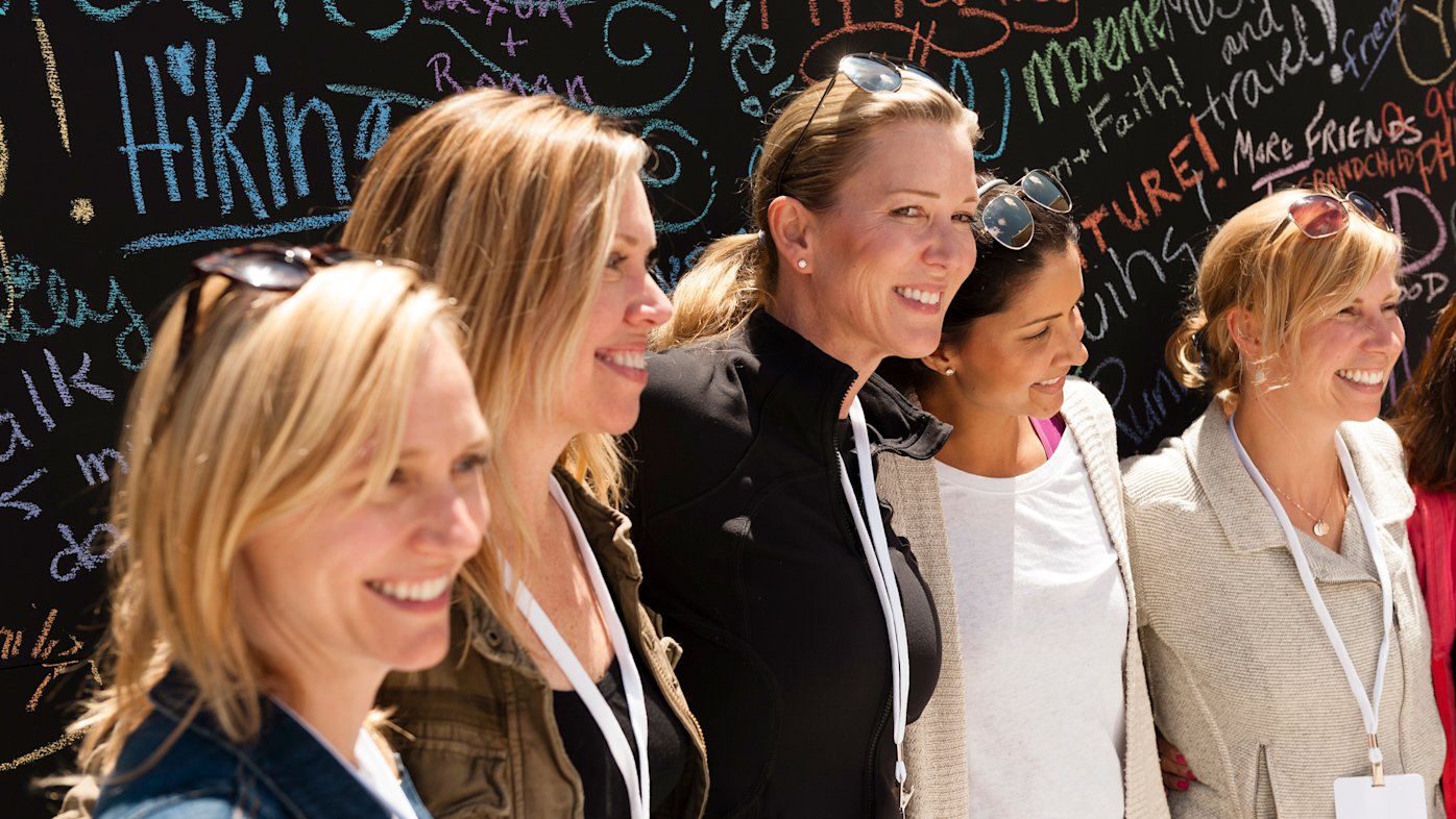 Photo of a group of women standing next to each other at the Sharp Women's Health Conference