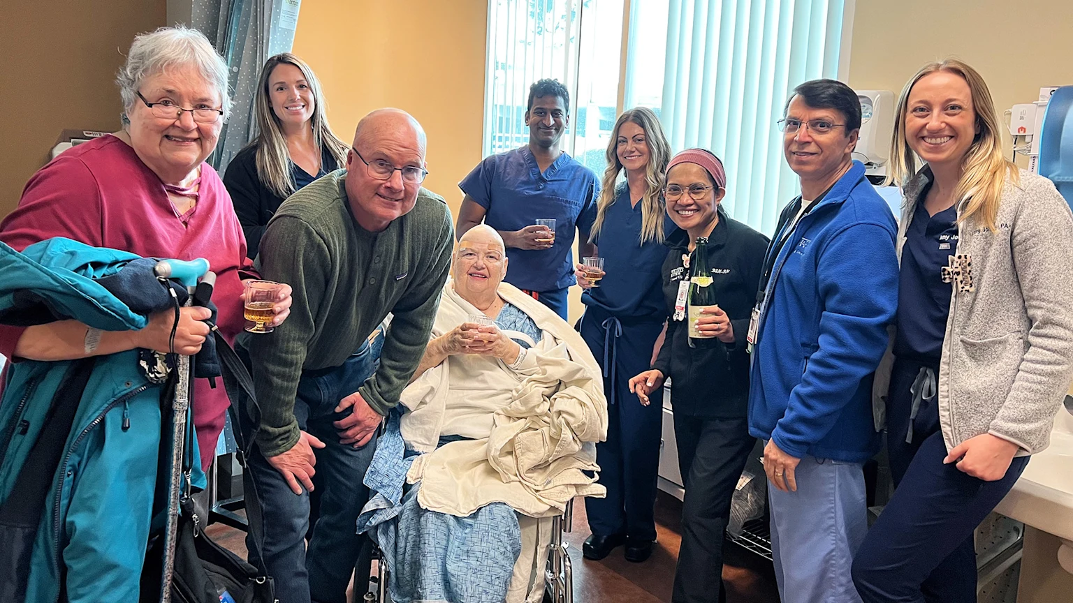 Bonnie Conway of San Diego at Sharp Grossmont Hospital with Dr. Vamsi Chavakula and the focused ultrasound team
