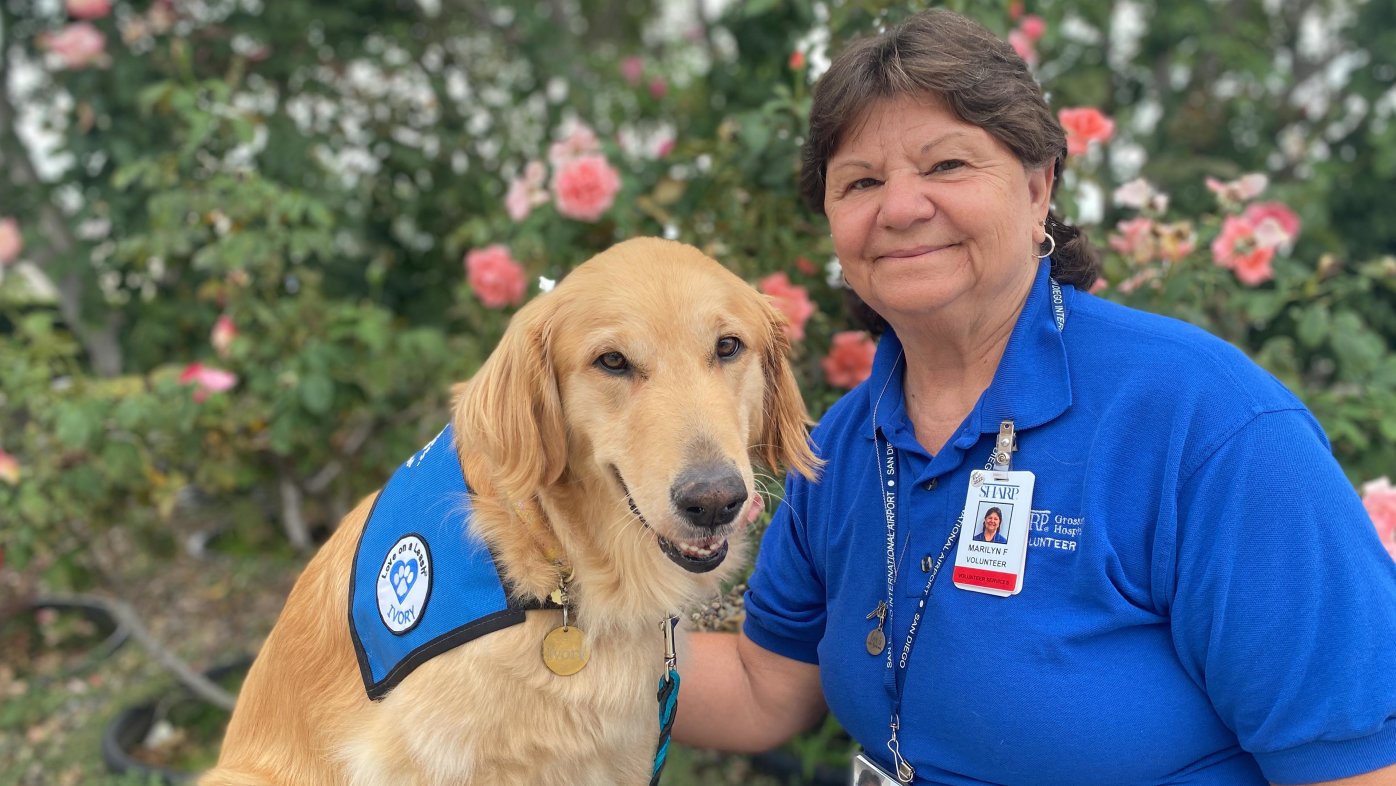 Sharp Grossmont Hospital volunteer Marilyn Fullen with her dog, Ivory