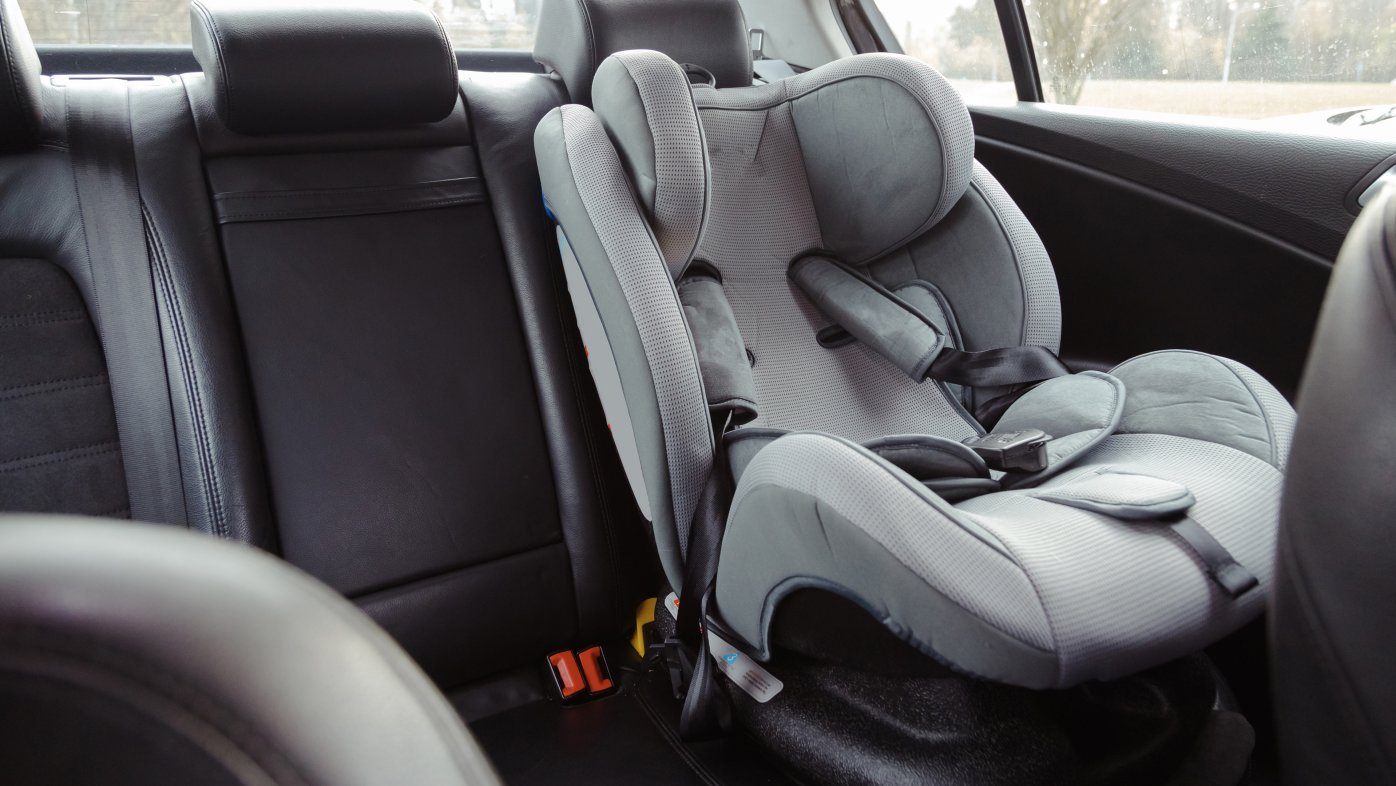 Car seat in the back seat of a car
