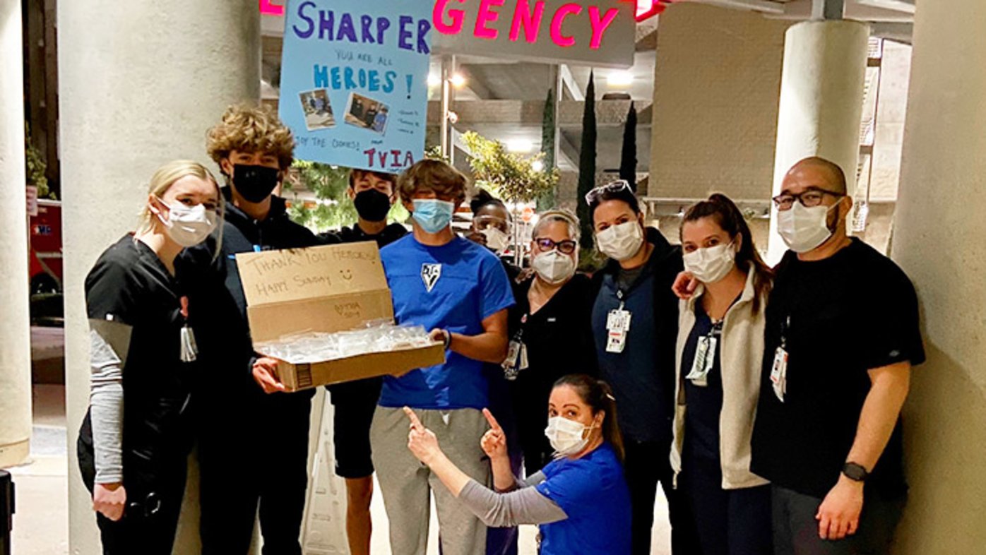 Teen Volunteers in Action SD1 dropping off a box of homemade cookies for the Sharp Memorial Hospital Emergency Room team.