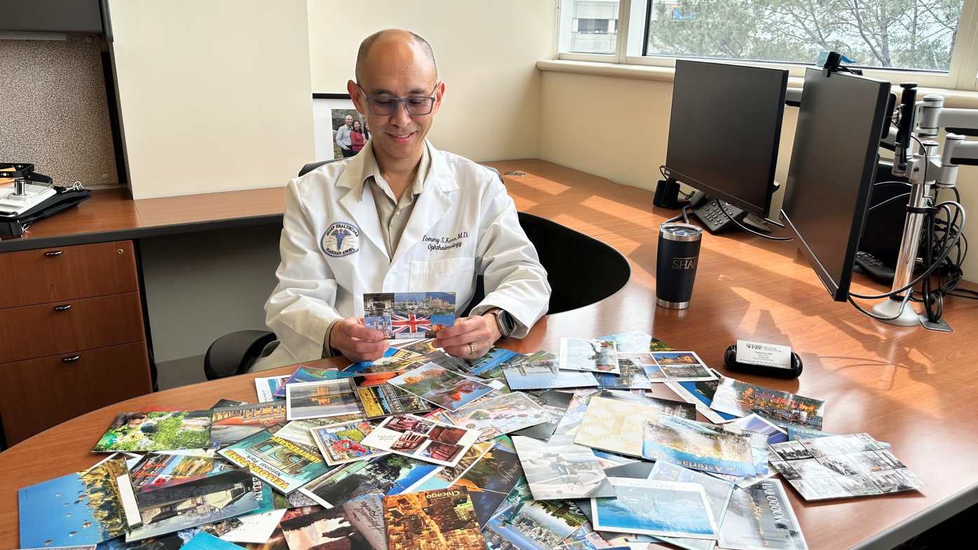 Dr. Tommy Korn of Sharp Rees-Stealy with patient postcards