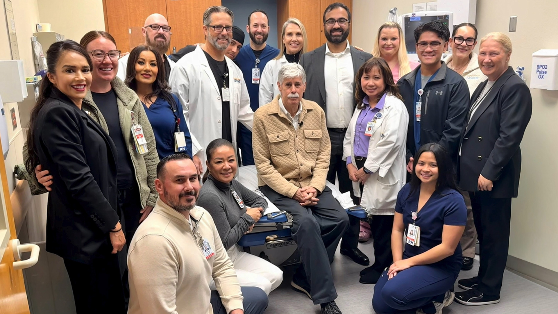 Douglas Erns of San Diego with his Sharp HealthCare team
