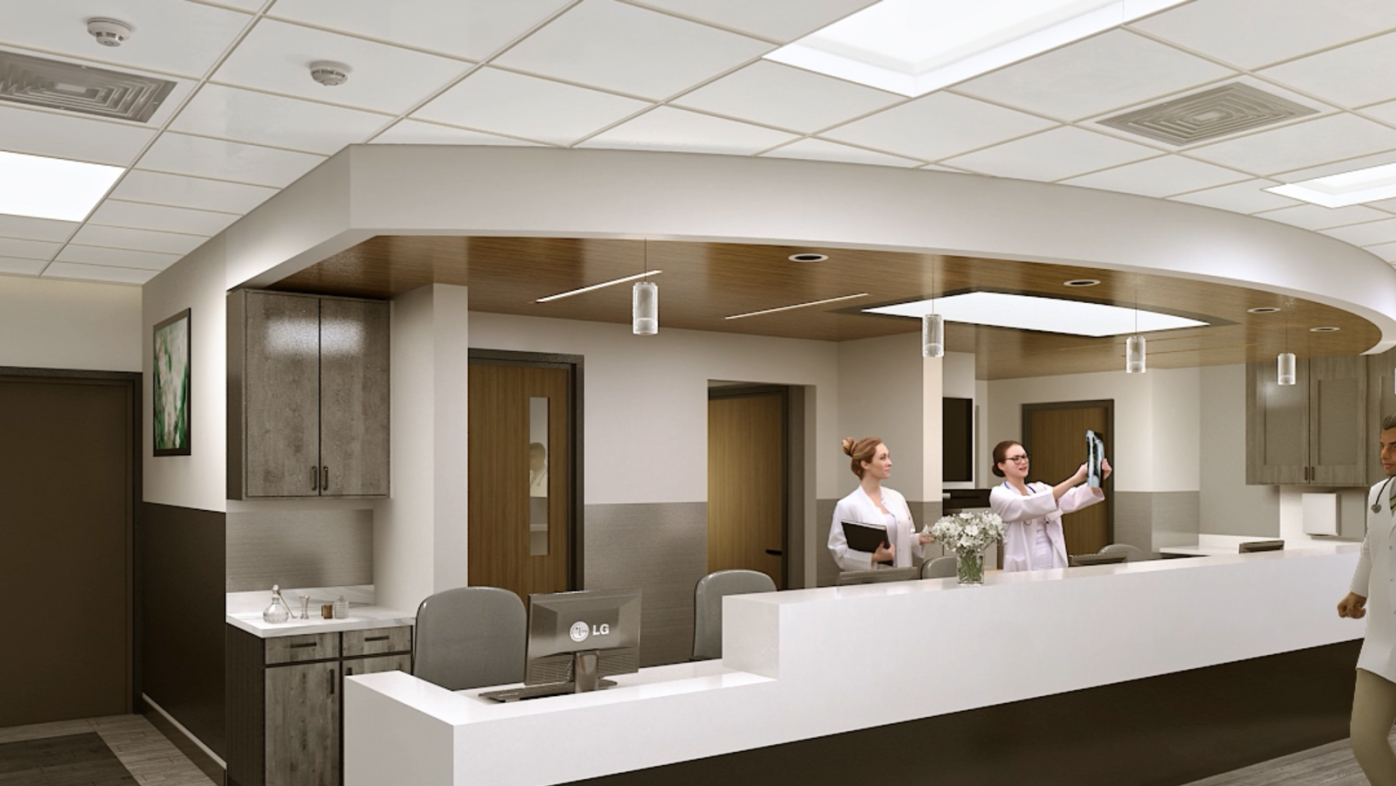 Artist rendering of nurses station with white desks and trim and dark brown wooden features