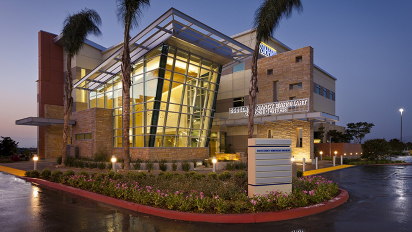 Exterior night time shot of Douglas & Nancy Barnhart Cancer Center