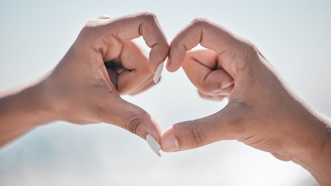 Two hands forming a heart shape