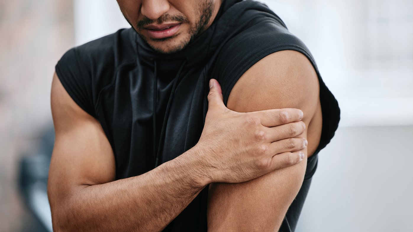 Man experiencing shoulder pain