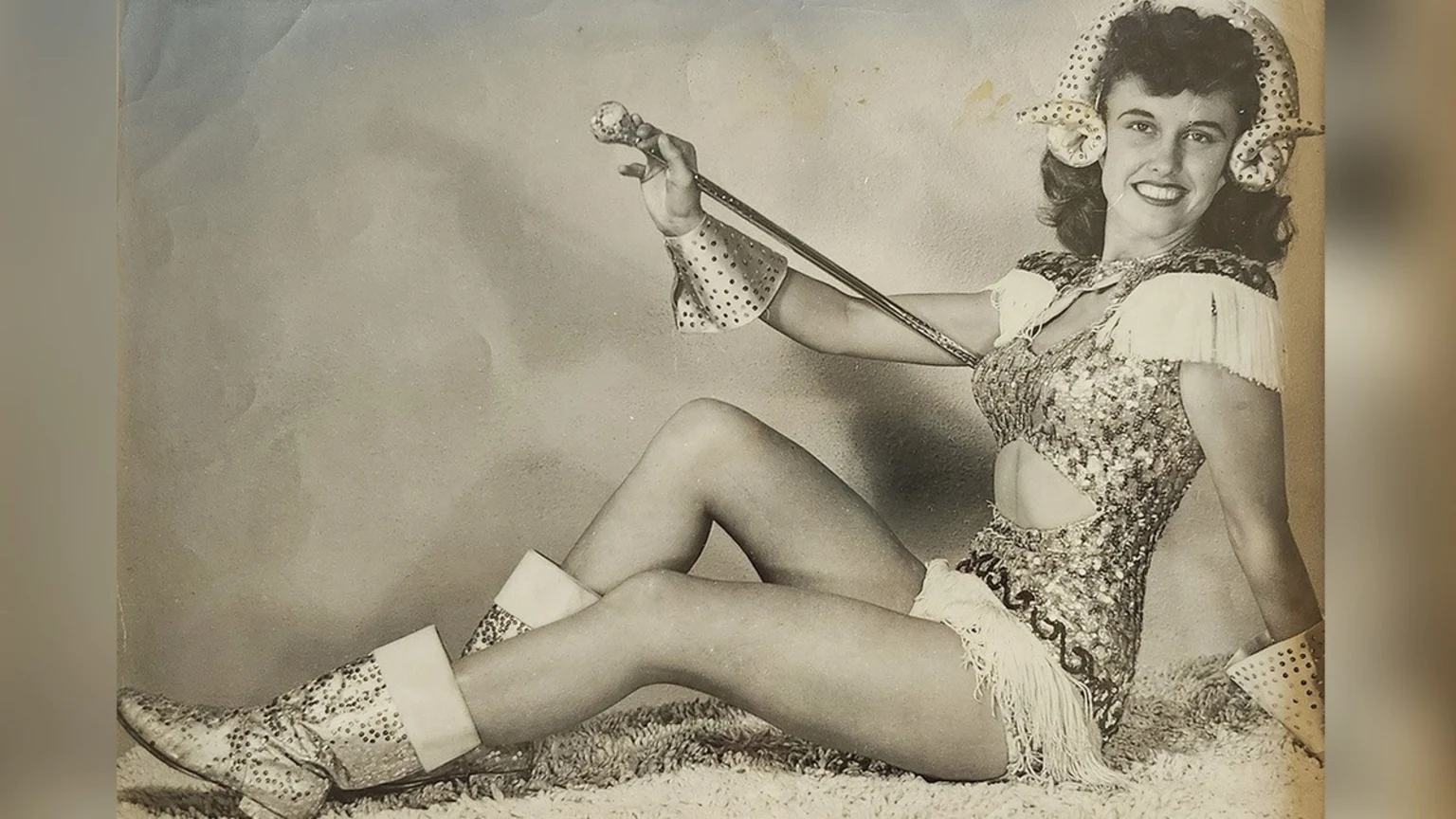 Barbara Chrestman of San Diego in her cheerleader gear