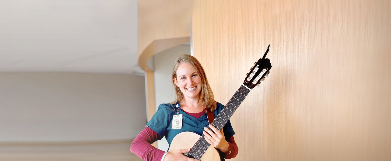 Woman holding guitar