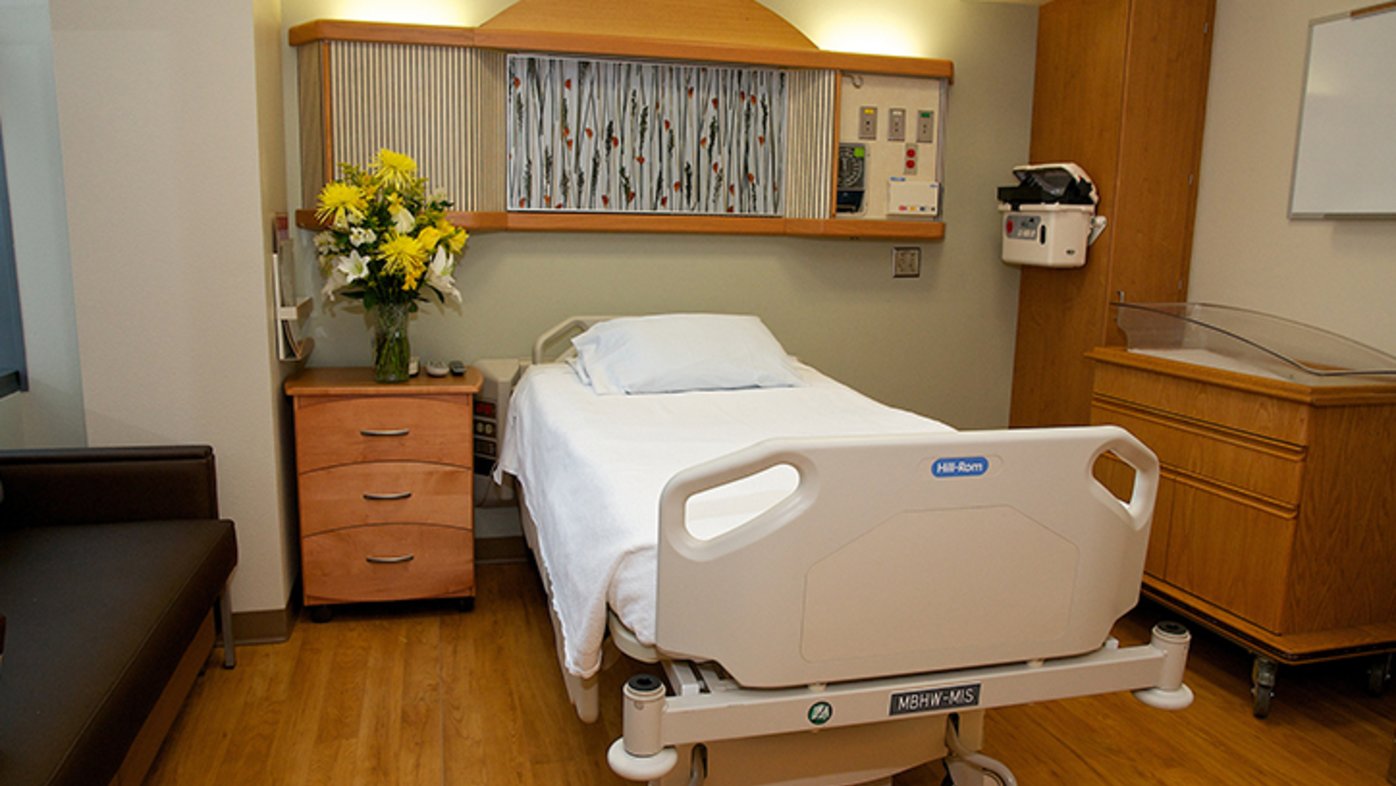 Patient room at Mary Birch with bassinet