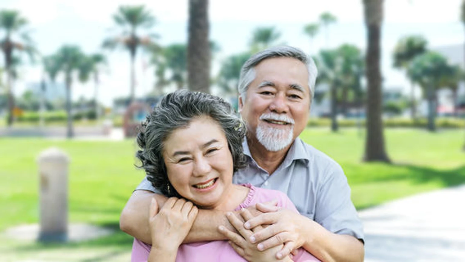Couple smiling at park