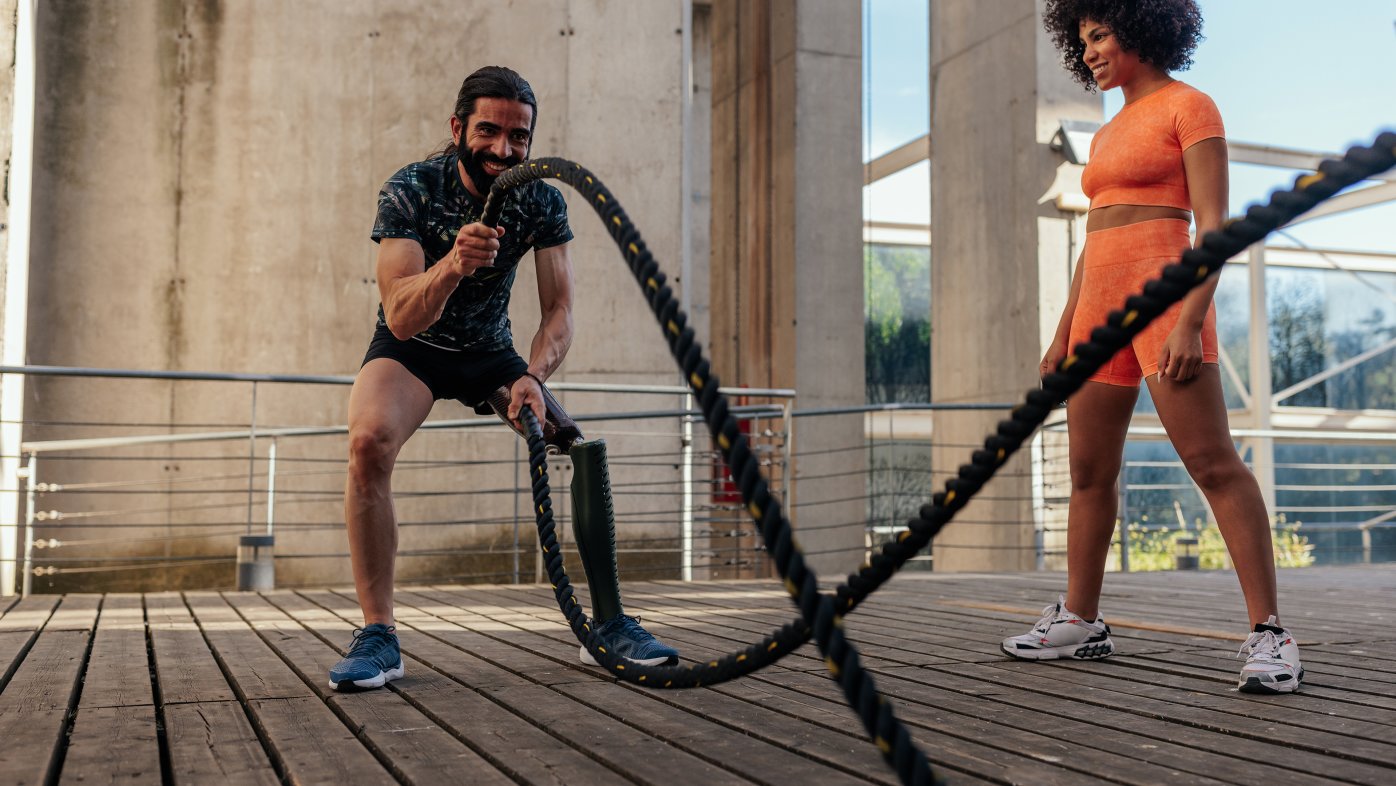 People exercising with ropes outdoors