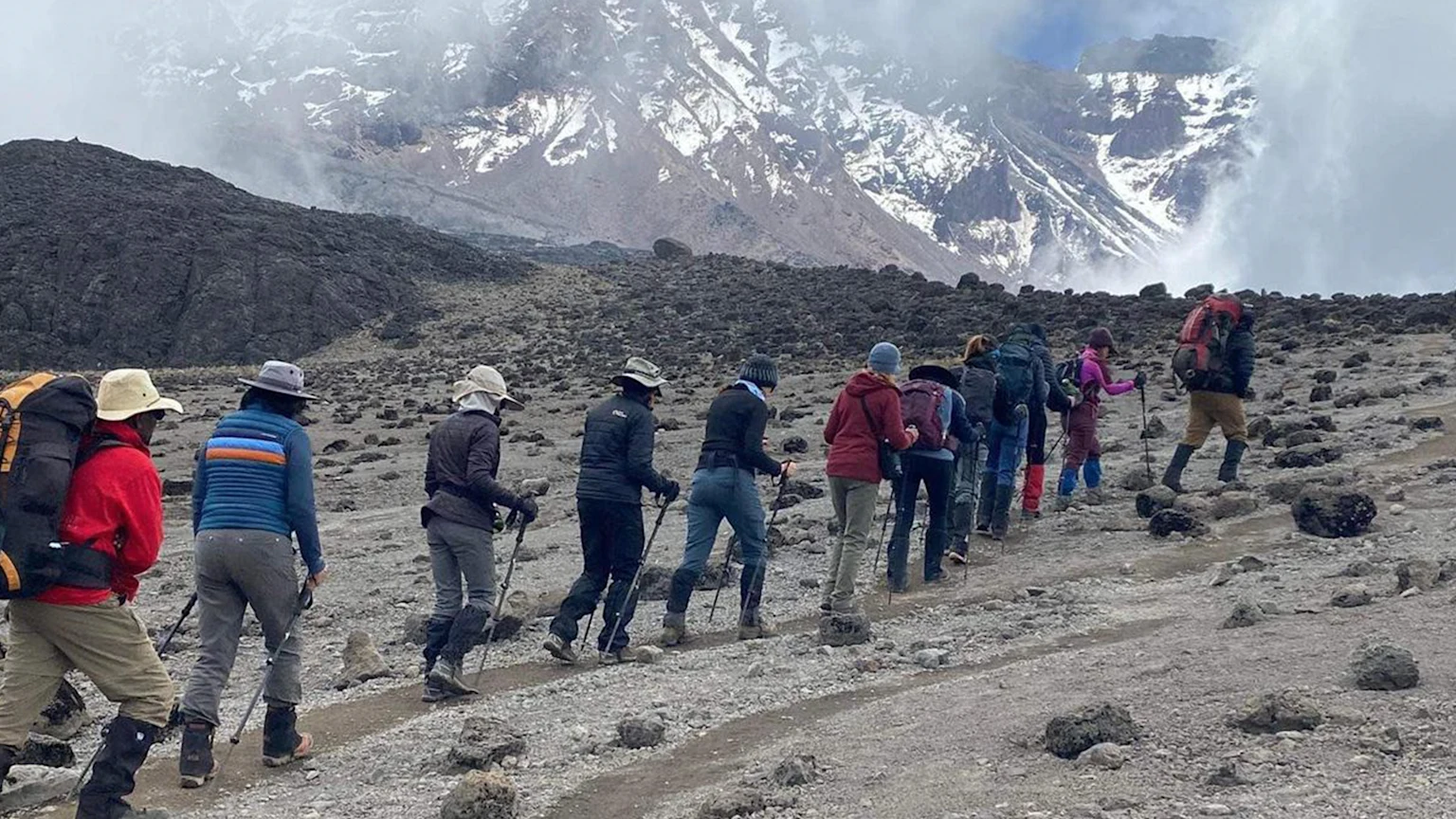 Julie Boorman of Sharp HealthCare and the "Kiliqueens" climbing Mount Kilimanjaro