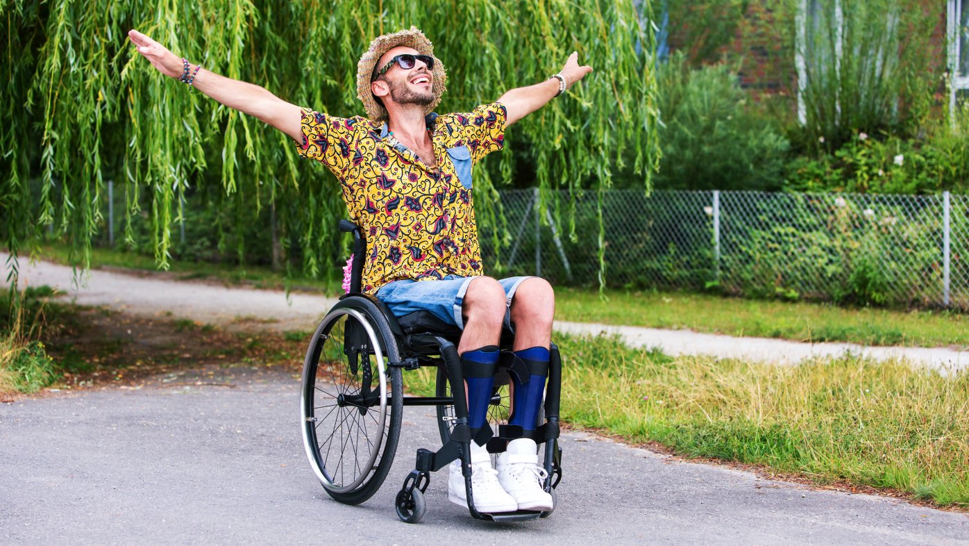 Man smiling in wheelchair