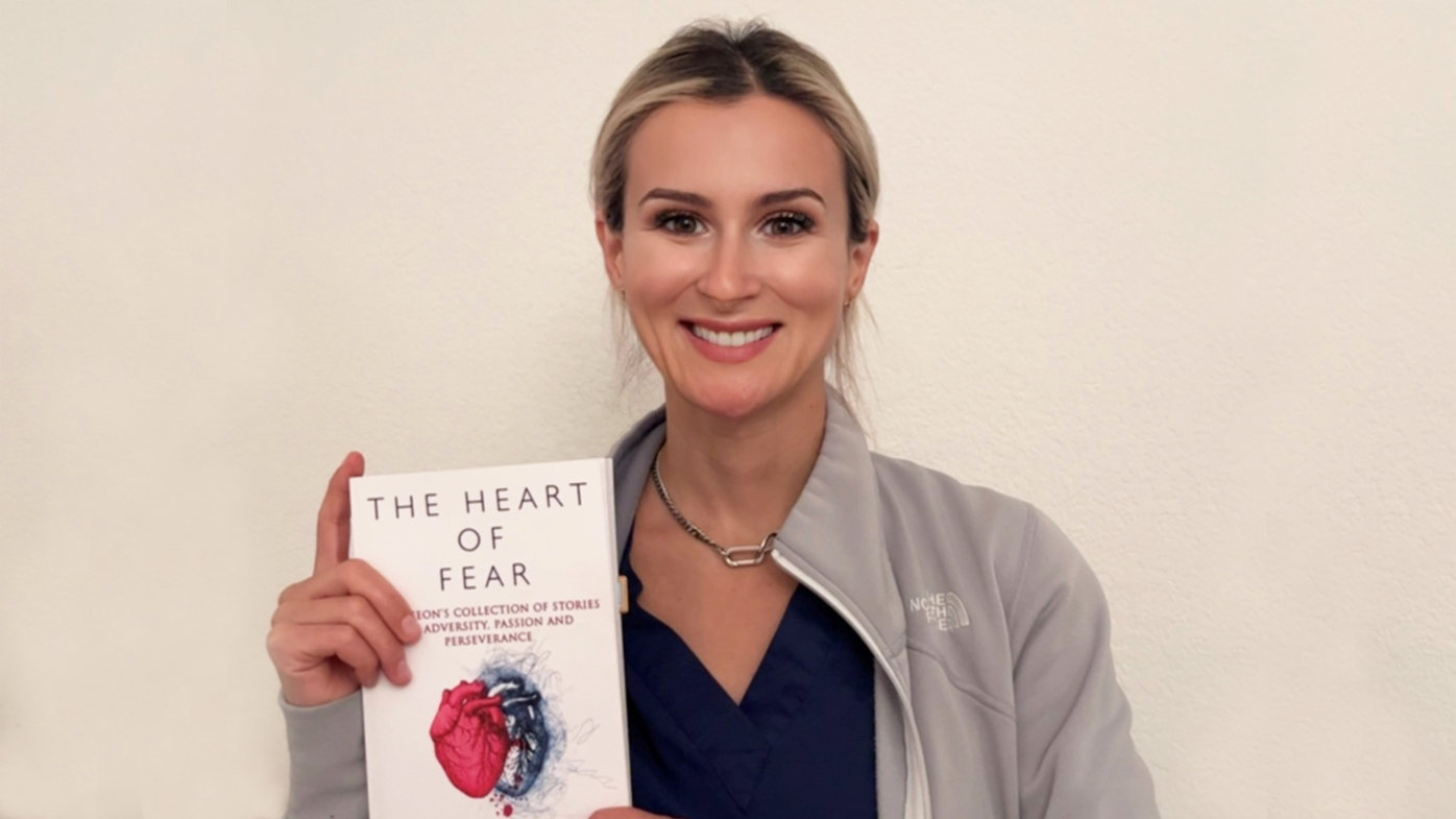 Dr. Alexandra Kharazi of Sharp HealthCare with her book, The Heart of Fear