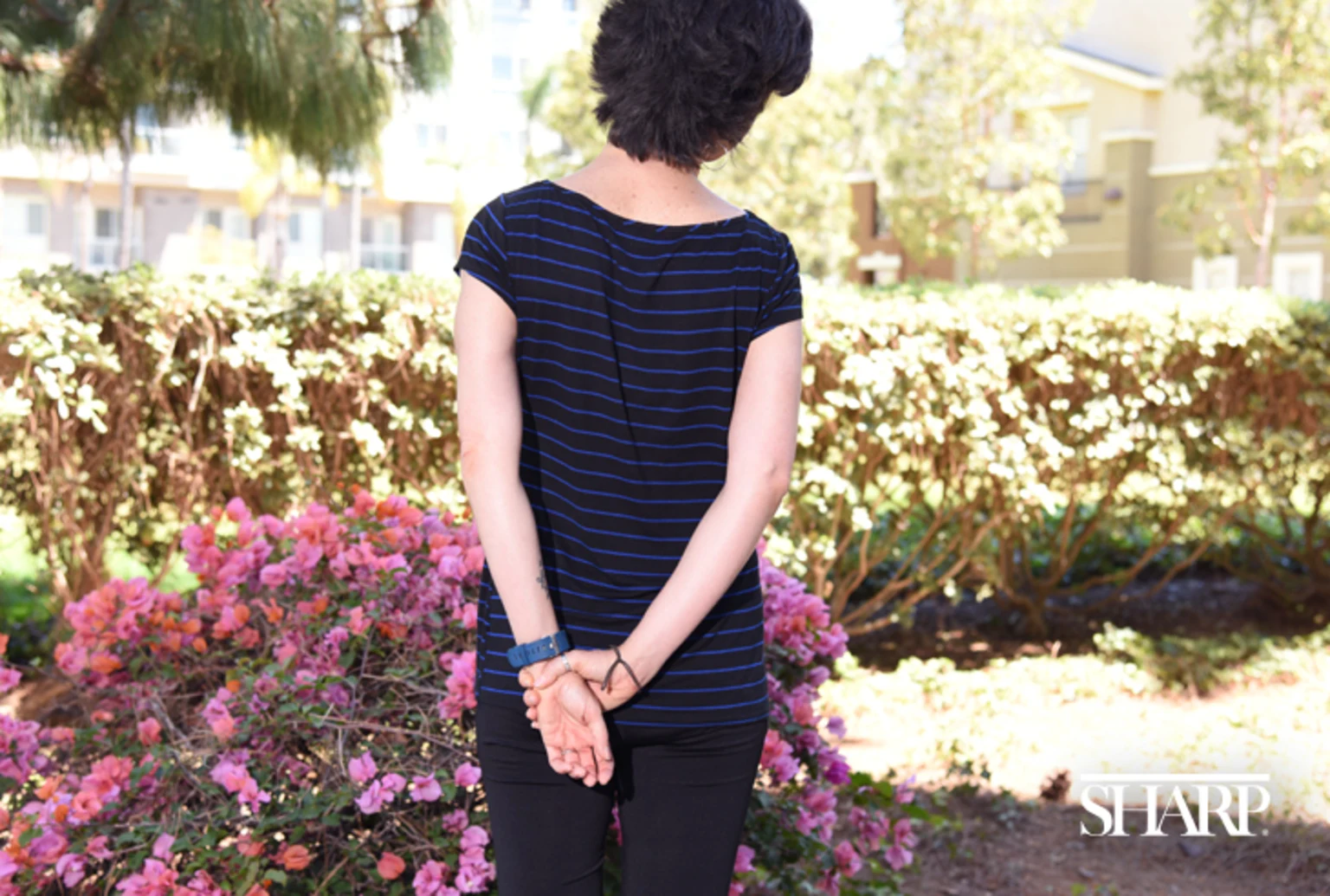 Midday-stretches-HN1388-Olga-DSC-1804-Arms-Behind-Back-Logo-Sized
