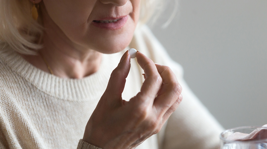 Woman taking medication