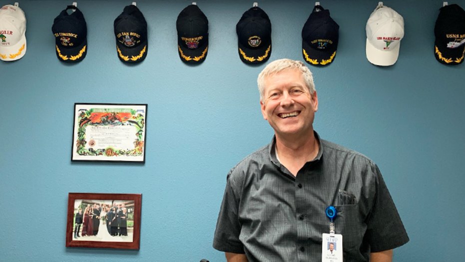 Dr. Lloyd Burgess in his office