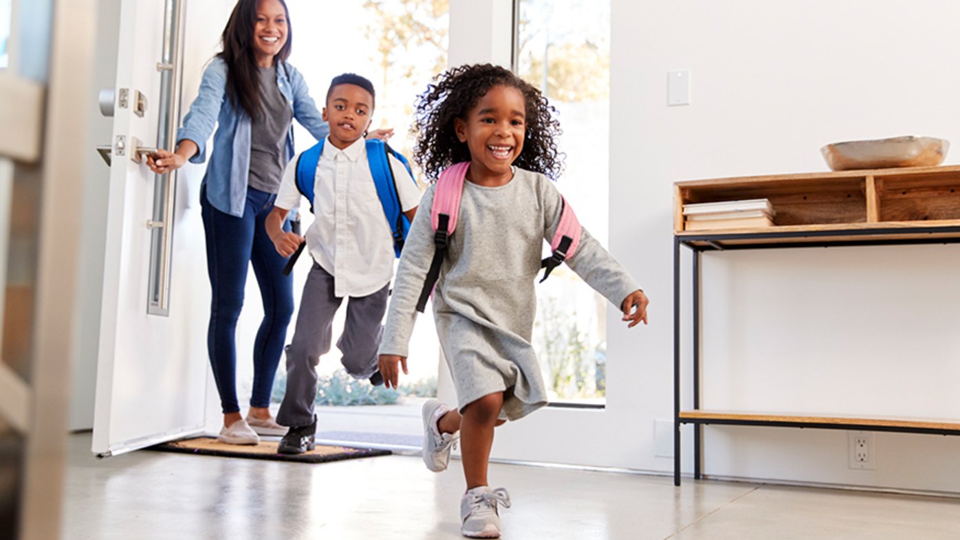 Kids running into a house