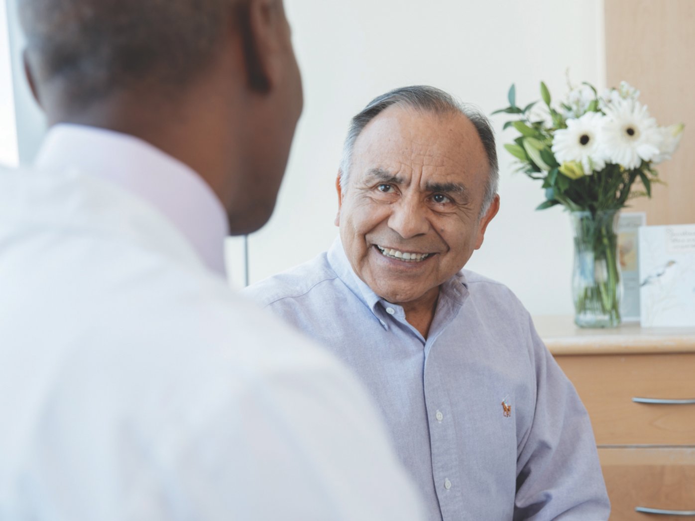 Senior man talking to his doctor