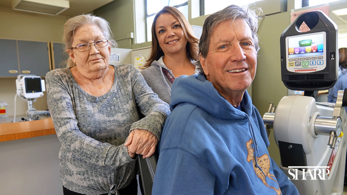 Jacquelyn Ayers (left), Kurt Mengel (right) and pulmonary rehab specialist April Brohamer (center)