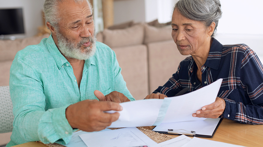 Man and woman looking at documents